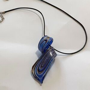 Hand crafted swirl 3" glass pendant necklace 19" blue gold black white tones